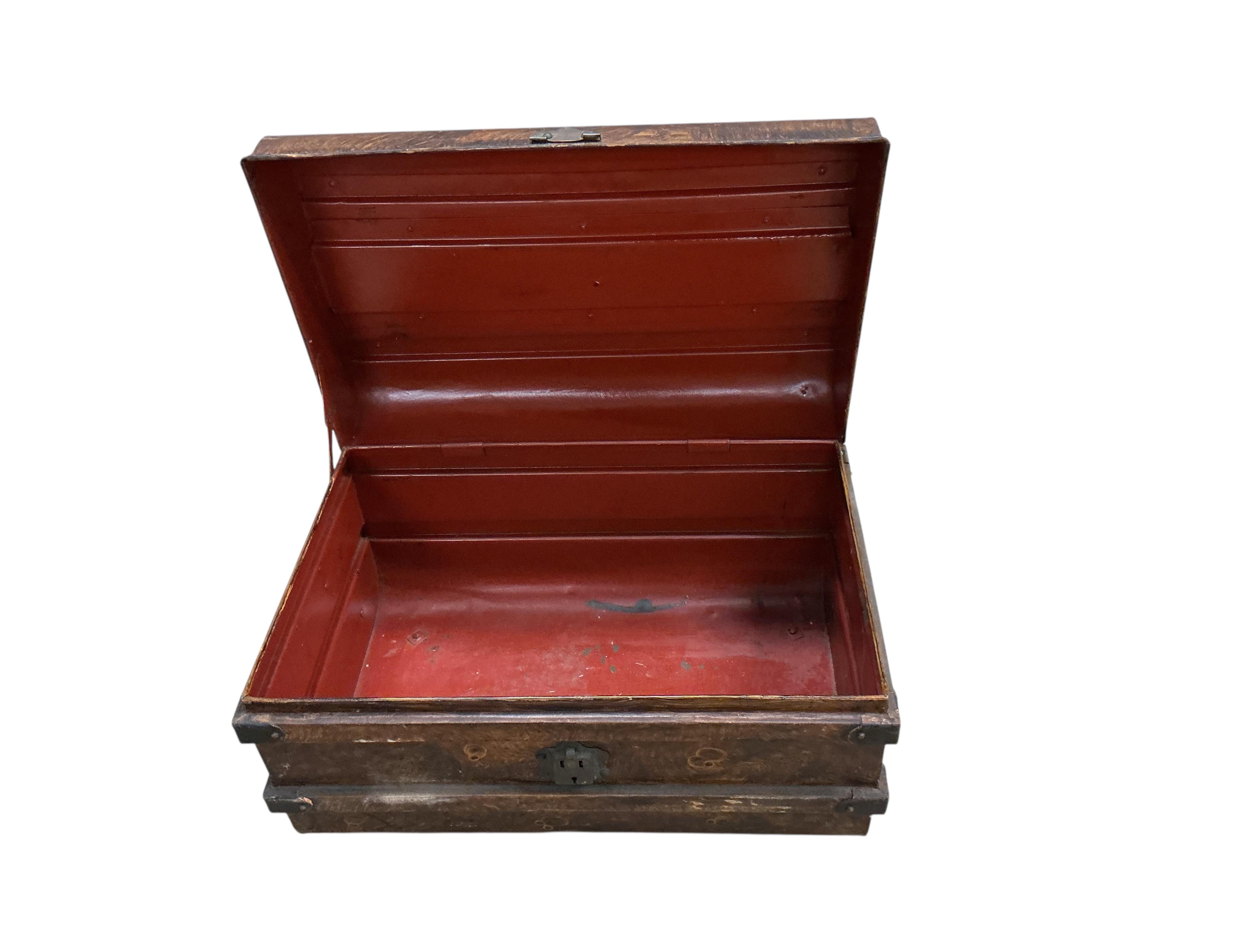 A Victorian painted tin trunk, width 60cm, depth 40cm, height 36cm together with a later larger canvas covered trunk